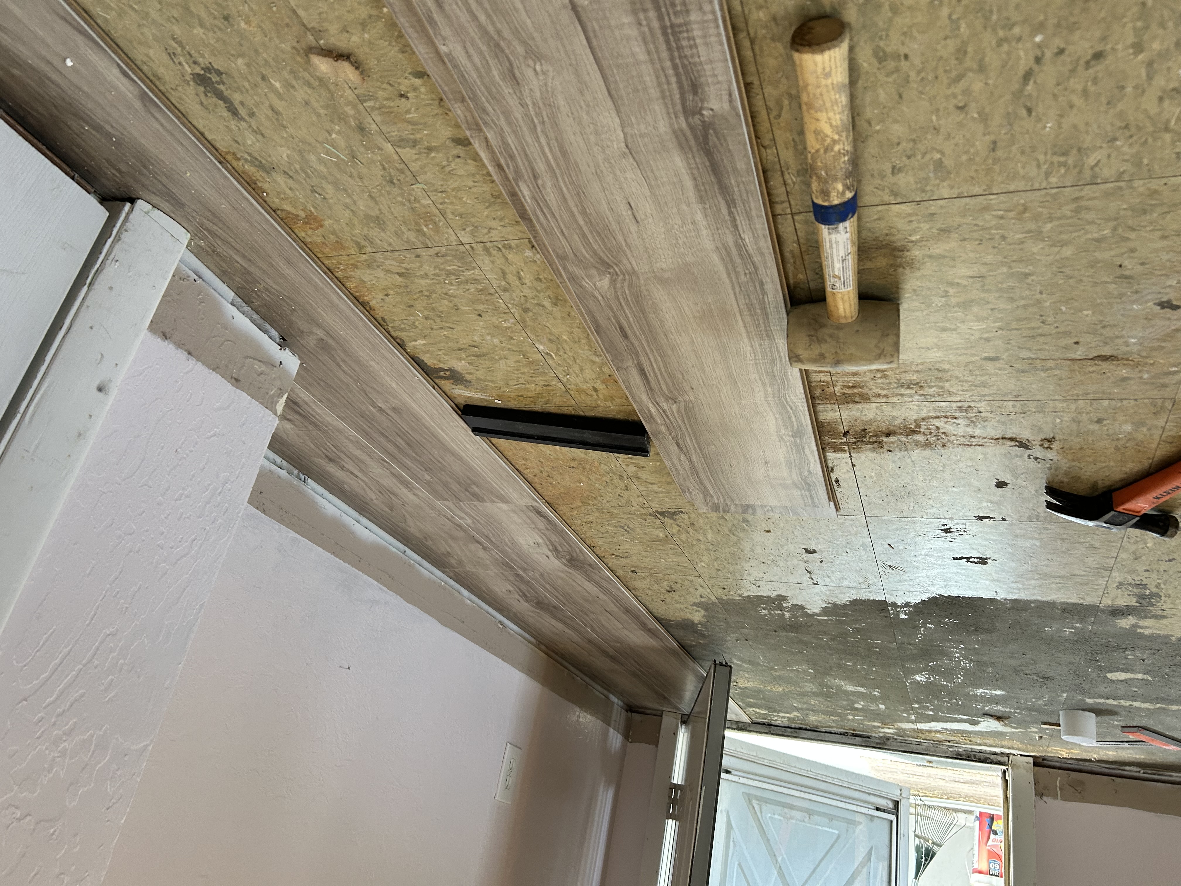 LVP flooring install – door threshold detail