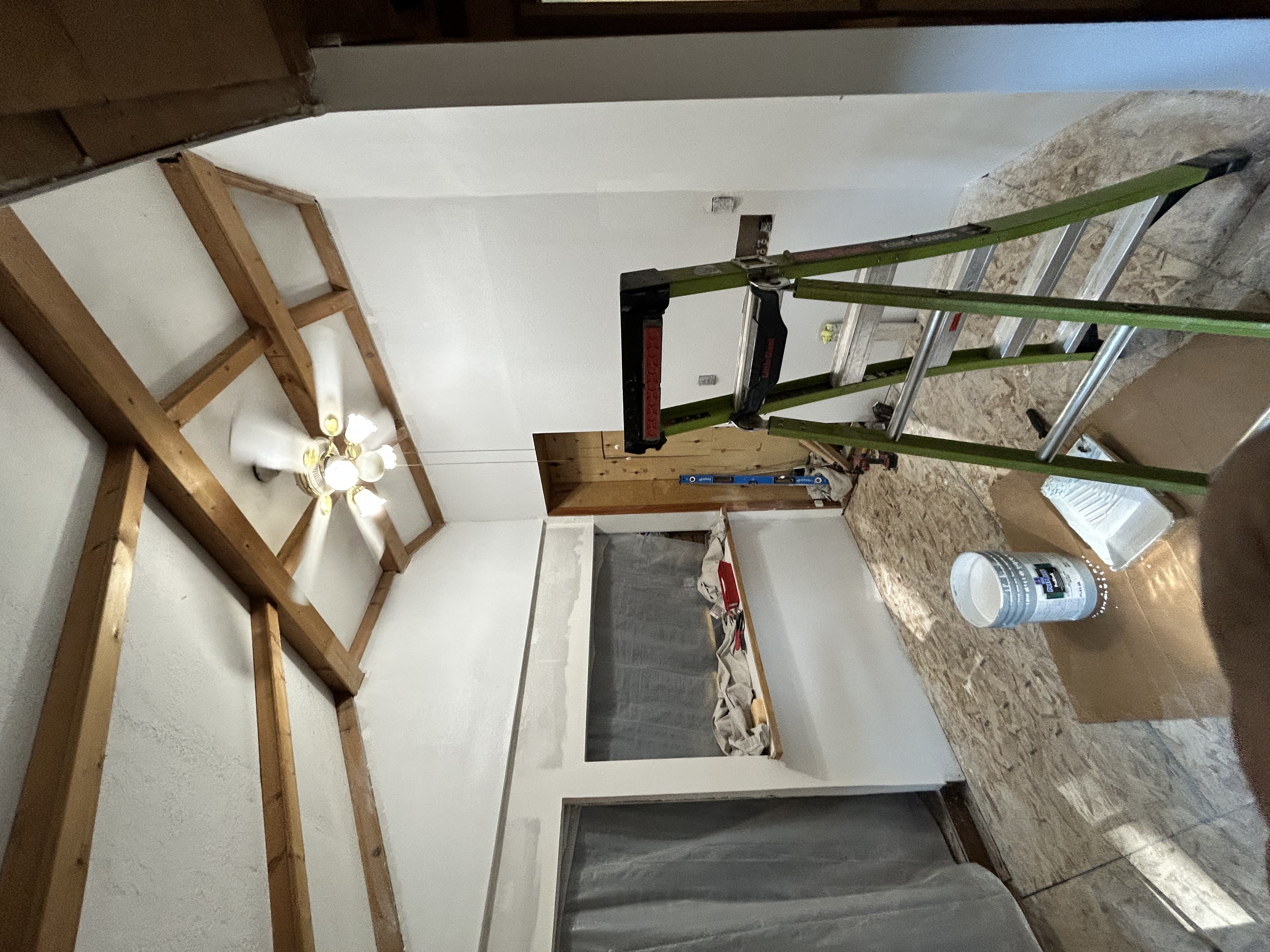 Interior remodel – vaulted beam ceiling, ladder and open door frame in progress