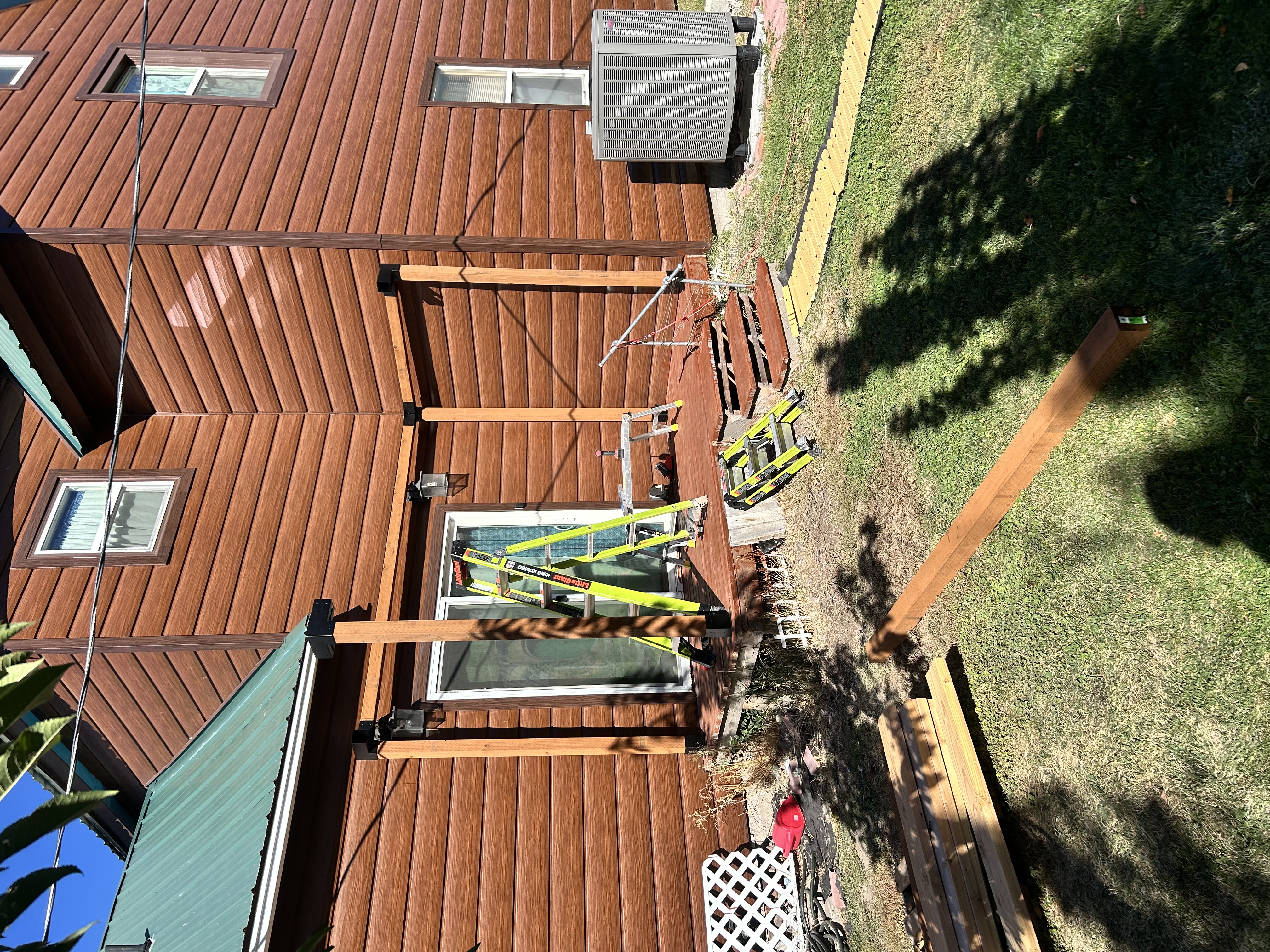 Log cabin back deck – mid-build with pergola framing