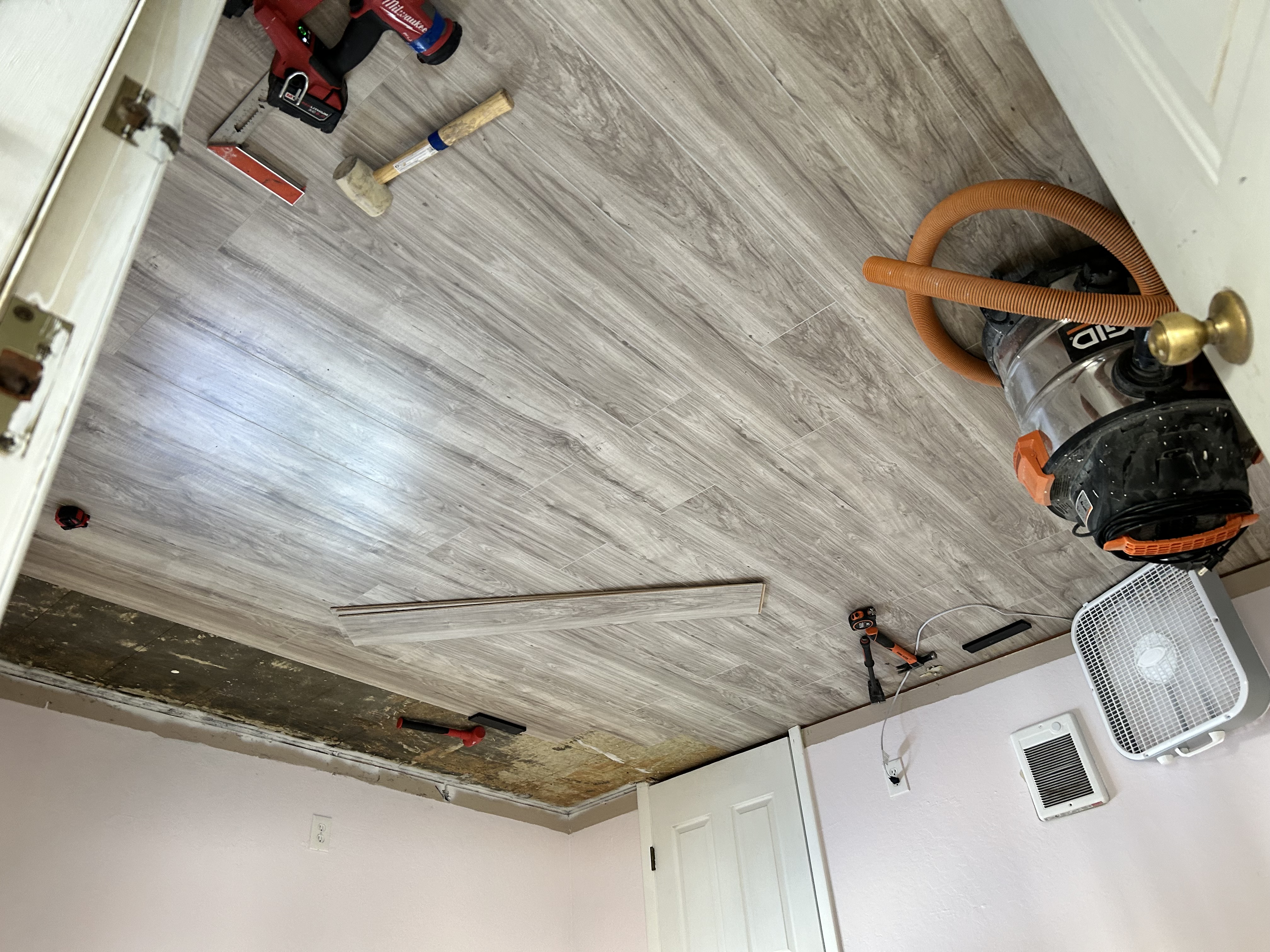 LVP flooring install in progress – bedroom